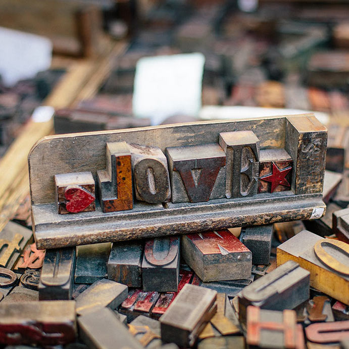 Love spelling with printing typesetting blocks