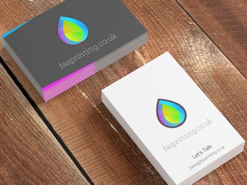 Two stacks of business cards with FAS Printing logo